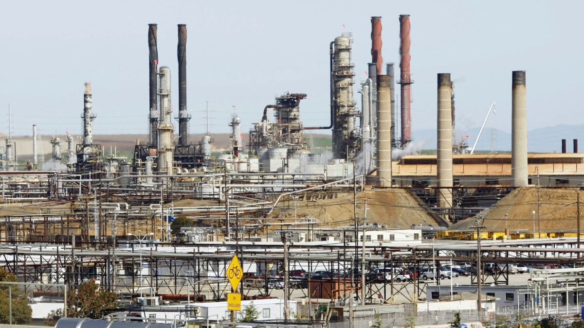 The city of Richmond, where Chevron's refinery is located, is among several municipalities suing Chevron and other oil companies over climate change.