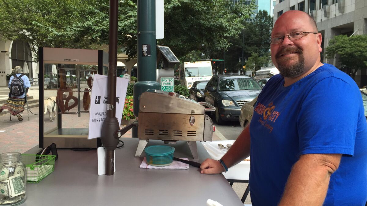 Downtown pretzel vendor Reed Goe worries the state's political tensions will continue.