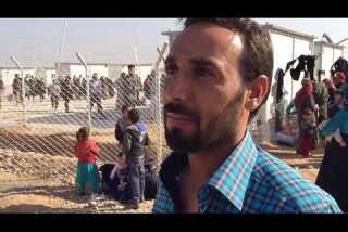 Families displaced by fighting in Mosul flee to camps outside the city