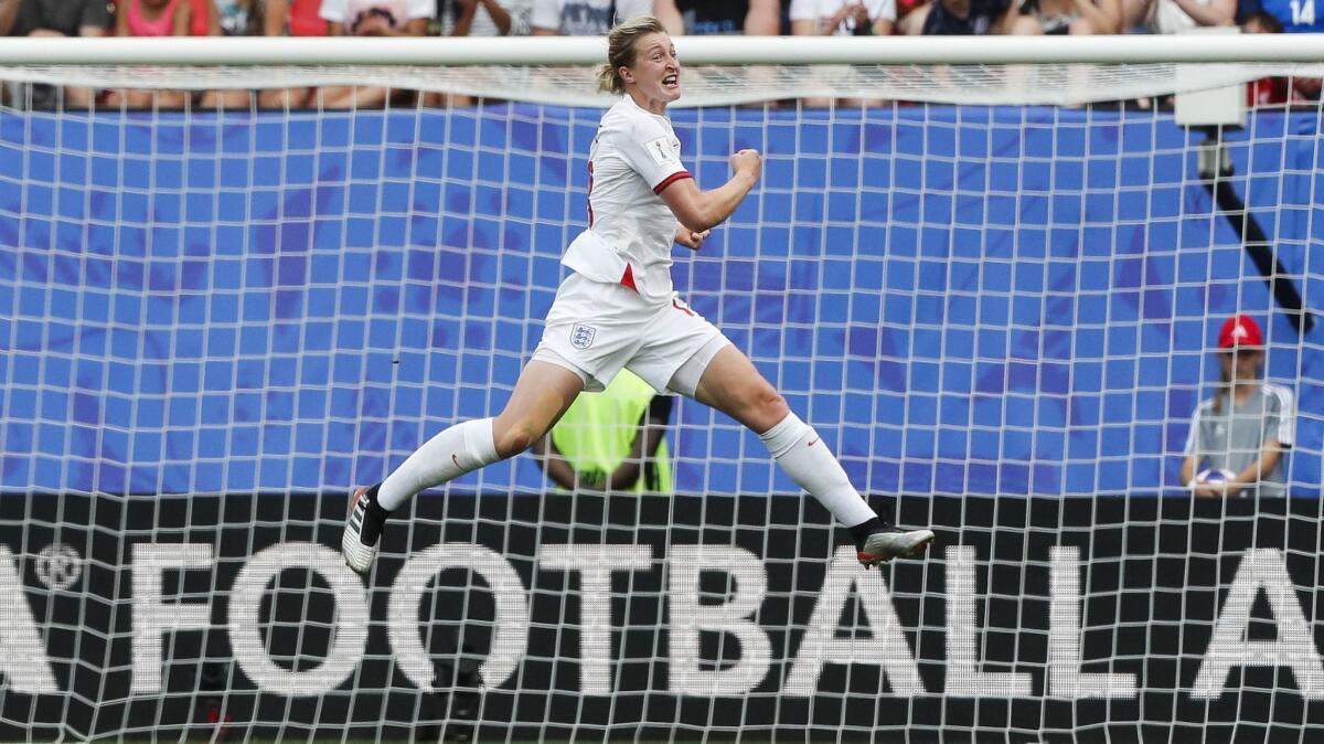 England's Ellen White celebrates after scoring a goal against Cameroon on June 23 in Valenciennes, France.