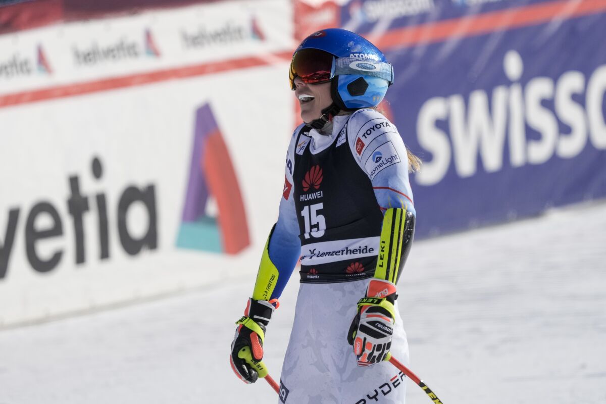 United States' Mikaela Shiffrin reacts as she crosses the finish line of an alpine ski, women's World Cup super-G, in Lenzerheide, Switzerland, Saturday, March 5, 2022. (AP Photo/Giovanni Auletta)