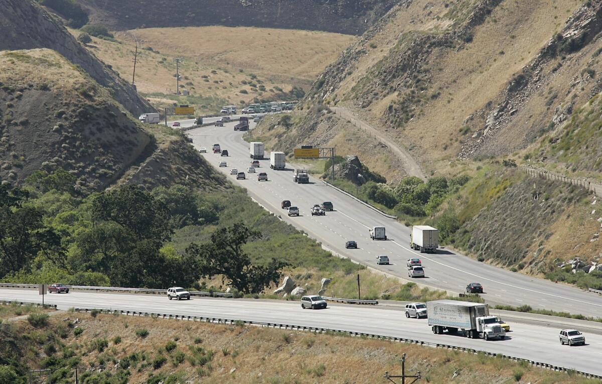 Vehicles traverse the Grapevine of the 5 Freeway near Lebec, Calif.