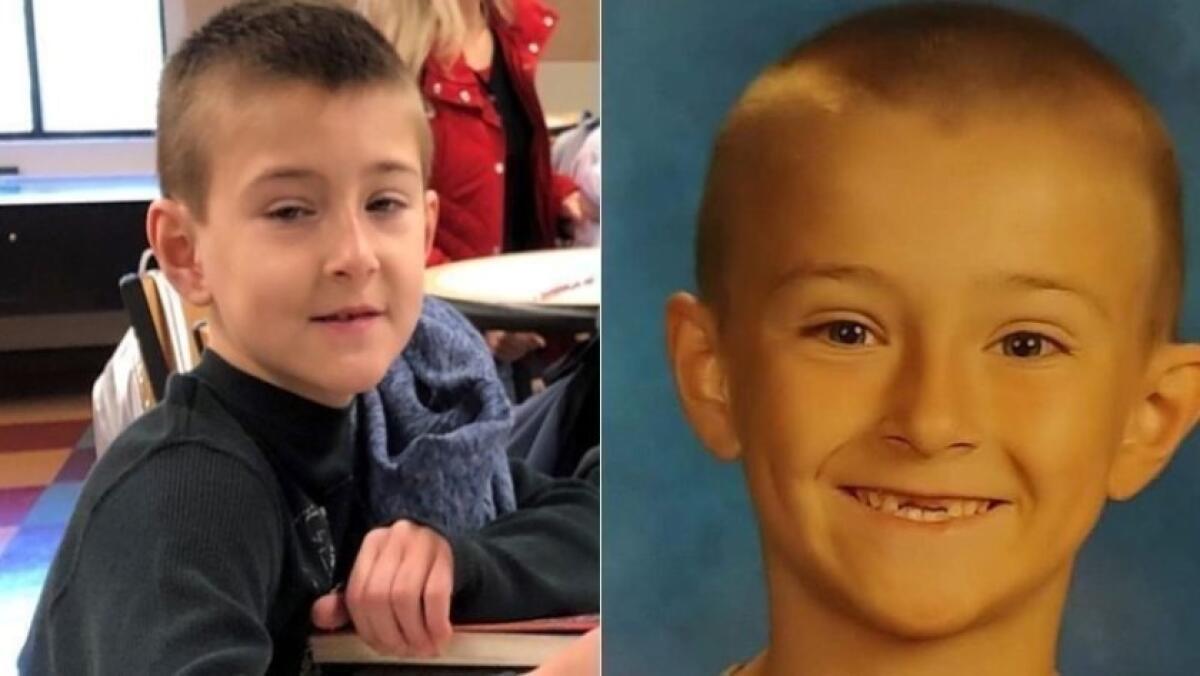 Noah McIntosh, 8, is shown in a photograph released by the Corona Police Department, left, and in a family photo.