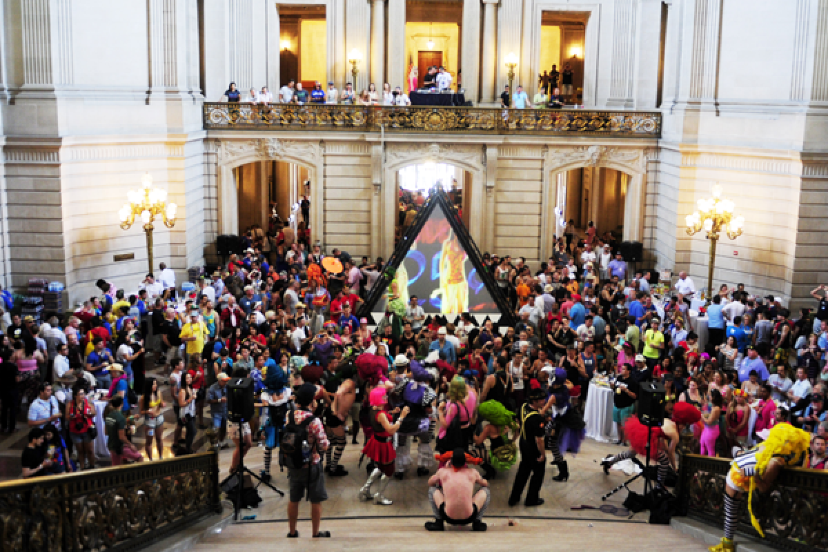 Parade attendees gather in the City Hall rotunda during the San Francisco Pride Celebration and Parade VIP Party in downtown San Francisco.