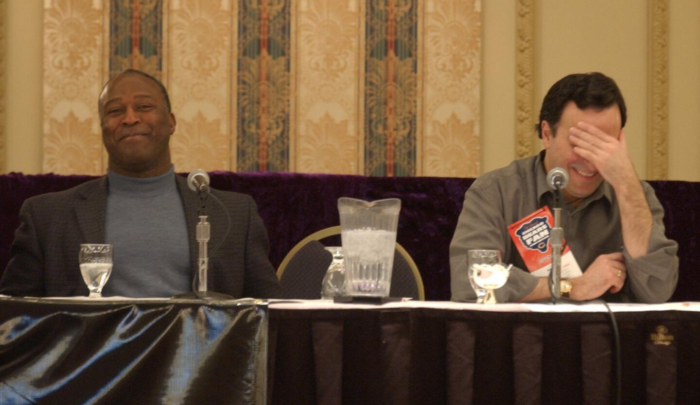 New Bears coach Lovie Smith and Bears president/CEO Ted Phillips react to questions at the Bears fan convention on Feb. 28, 2004.