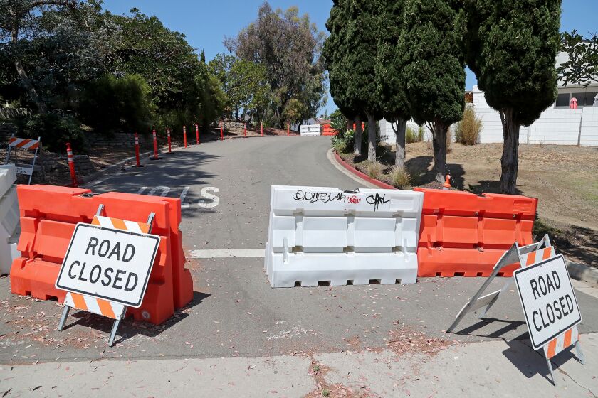 NEWPORT BEACH, CA - June 29: Temporary barricades block access along Ocean View Avenue at Tustin Avenue on Wednesday, June 29, 2022 in Newport Beach, CA. (Kevin Chang / Daily Pilot)
