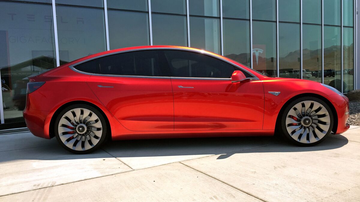 A Tesla Model 3 mockup shown Tuesday, July 26, 2016.