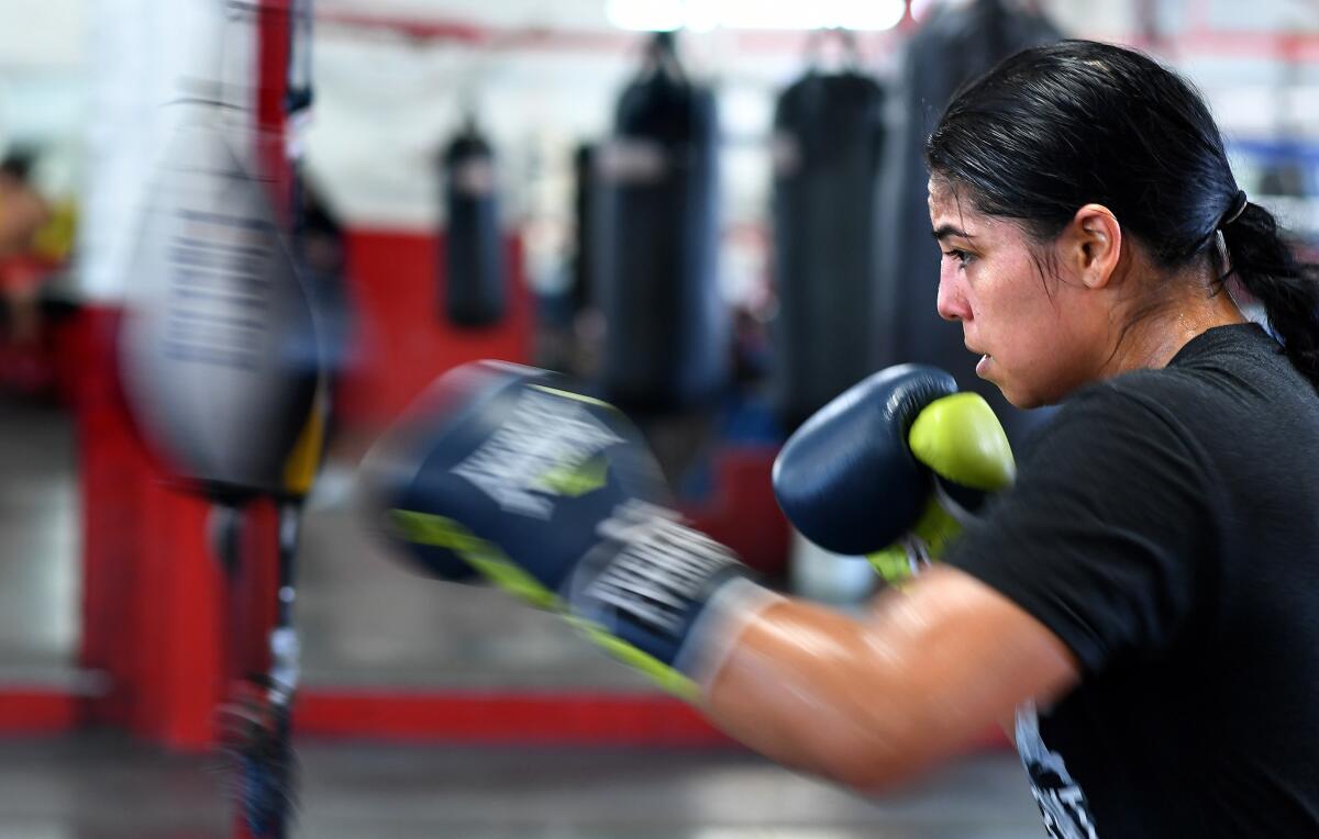 Maricela Cornejo trains in preparation for a bout in 2016.