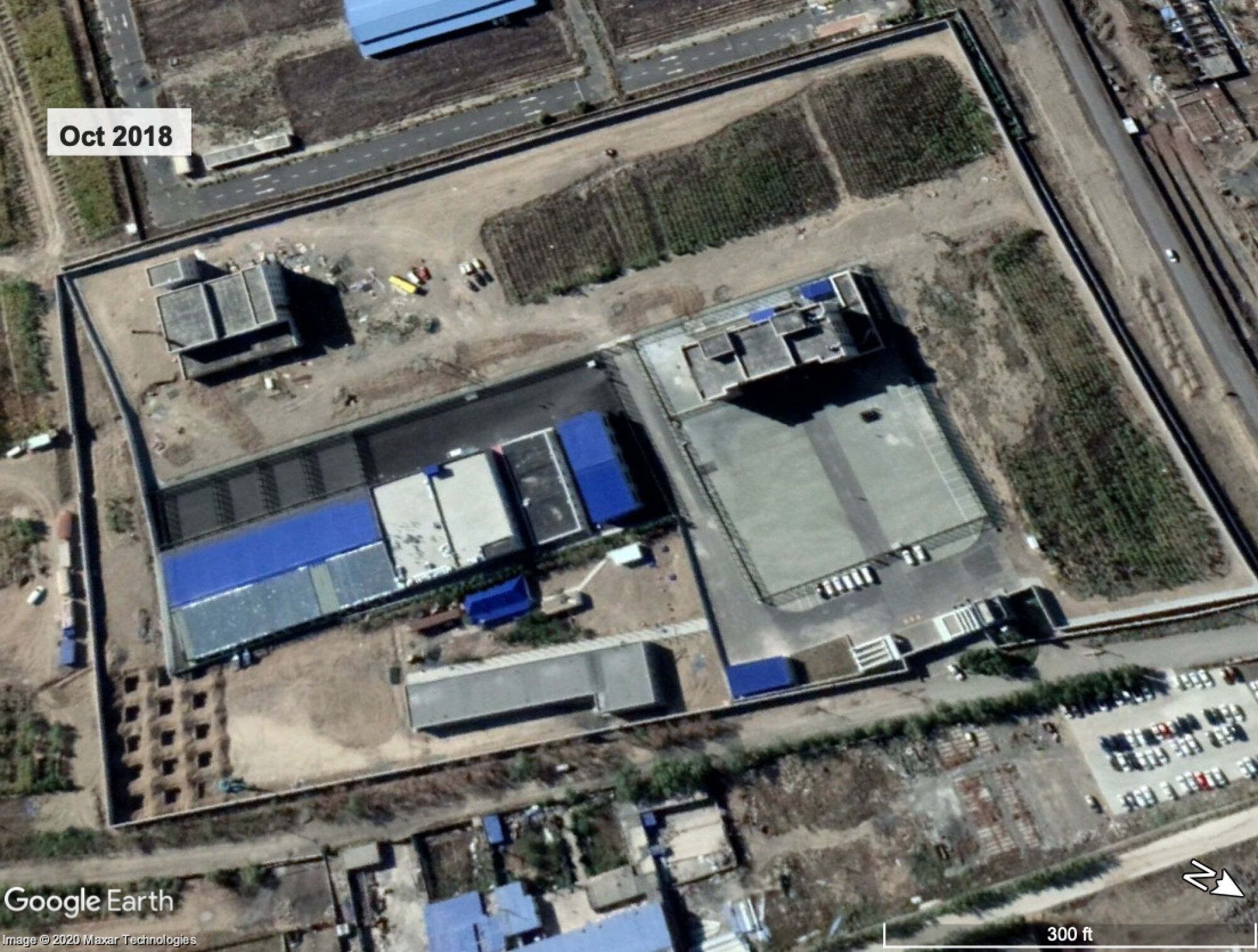 Satellite imagery of a suspected detention site in October 2018 shows internal walls and extensive wire fencing.