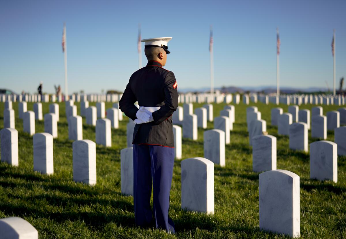PFC Isaiah Rosario Gonell stands watch among headstones