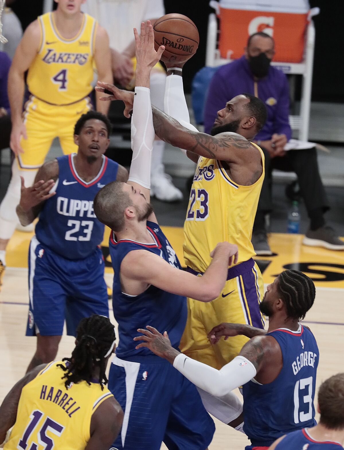 Lakers forward LeBron James is defended by Clippers center Ivica Zubac.