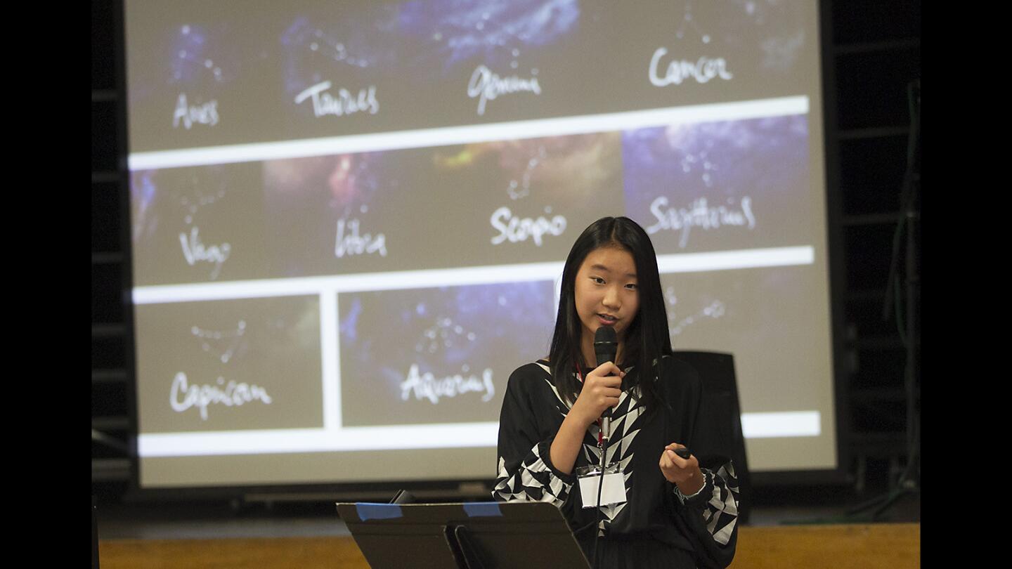 5th-grader Kaley Ouyang gives a short speech about zodiac signs as she participates in the mock TED Talk at Sonora Elementary School.