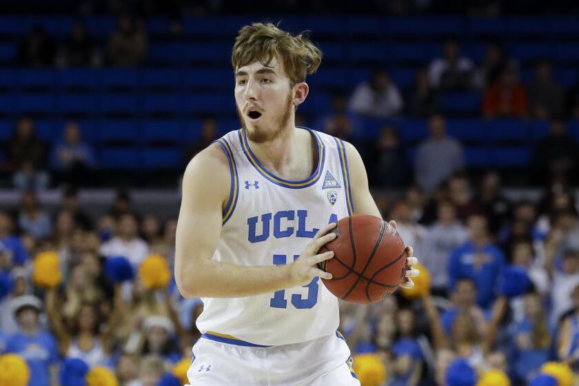 UCLA guard Jake Kyman plays against Stanford during the second half of an NCAA college basketball game in Los Angeles, Wednesday, Jan. 15, 2020. (AP Photo/Chris Carlson)