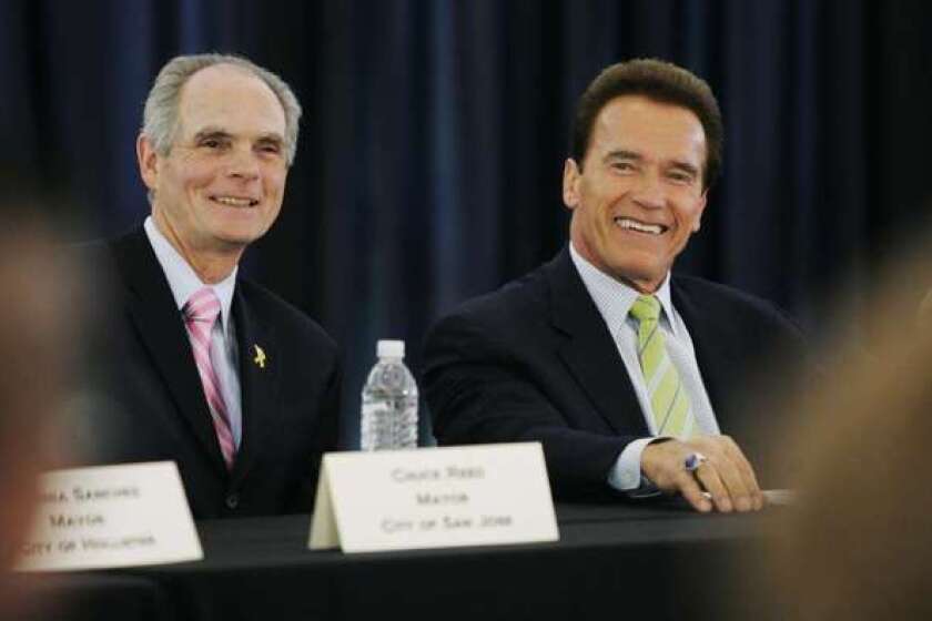 San Jose Mayor Chuck Reed, left, shown at left in 2009 with then-Gov. Arnold Schwarzenegger, is backing a proposed statewide ballot measure to allow reductions in retirement benefits for public employees.