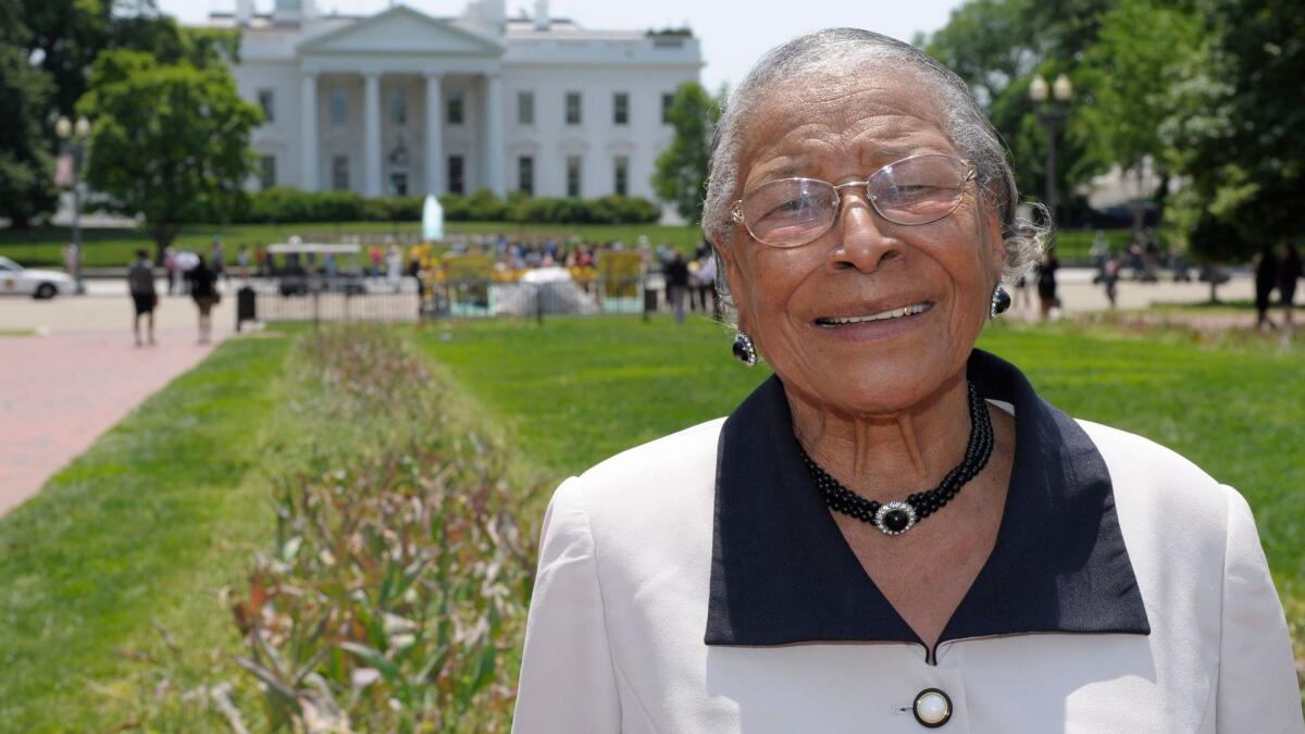 Recy Taylor stands in Lafayette Park after touring the White House in 2011.