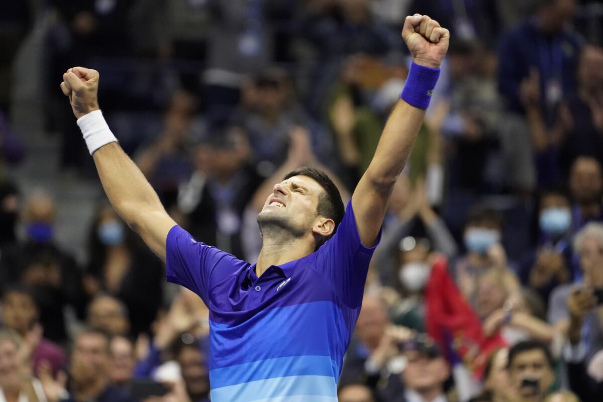 Novak Djokovic, of Serbia, reacts after defeating Alexander Zverev, of Germany, during the semifinals of the US Open tennis championships, Friday, Sept. 10, 2021, in New York. (AP Photo/John Minchillo)