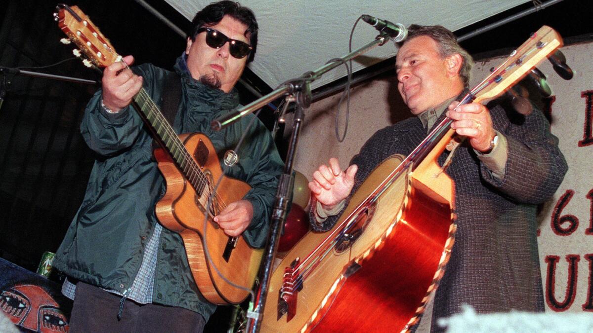 Ceasar Rosas and Conrad Lozano of Los Lobos playing on Feb. 6, 1999.