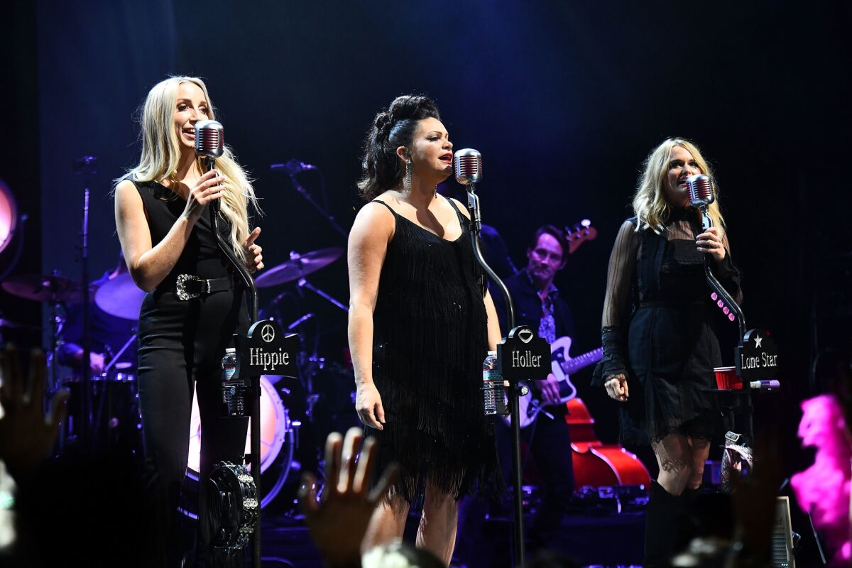 Miranda Lambert (far right) is shown performing with fellow Pistol Annies' members Ashley Monroe (left) and Angaleena Presley (center) in late 2018 in Los Angeles.