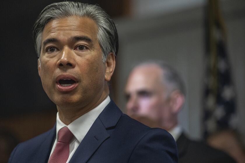 PASADENA, CA-OCTOBER 7, 2022: California Attorney General Rob Bonta announces the arrest of 56 individuals involved in a scheme resulting in the theft of nearly $5 million from hundreds of people in a widespread mail theft and postal fraud operation. The suspects, who operated out of multiple counties across California, including Los Angele County, allegedly altered stolen checks, deposited them into bank accounts, then quickly withdrew money from ATMs before the banks discovered the checks were forged. The California Department of Justice charged the suspects with felony grand theft, money laundering, and conspiracy. Press conference was held at the United States Postal Inspection Service in Pasadena. (Mel Melcon / Los Angeles Times)