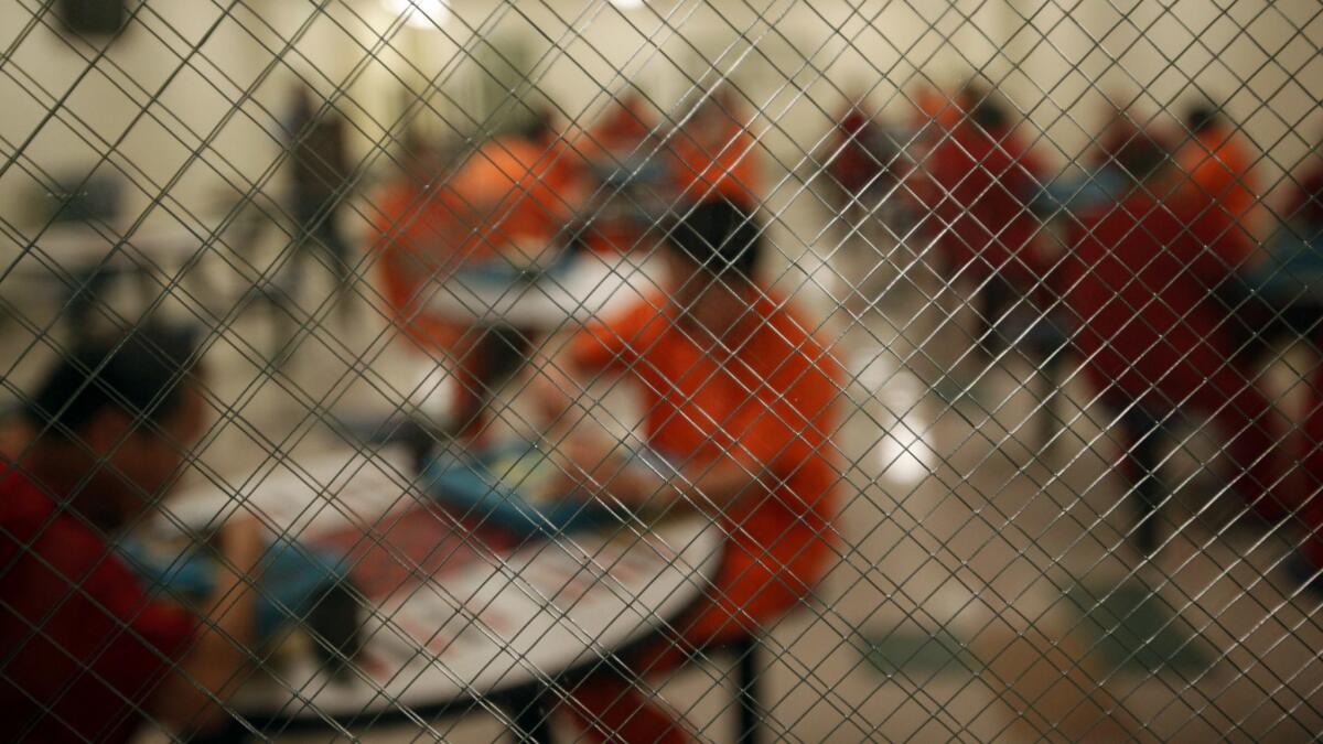 Detainees eat lunch at the ICE detention center in Bakersfield, Calif. on April 23, 2015.