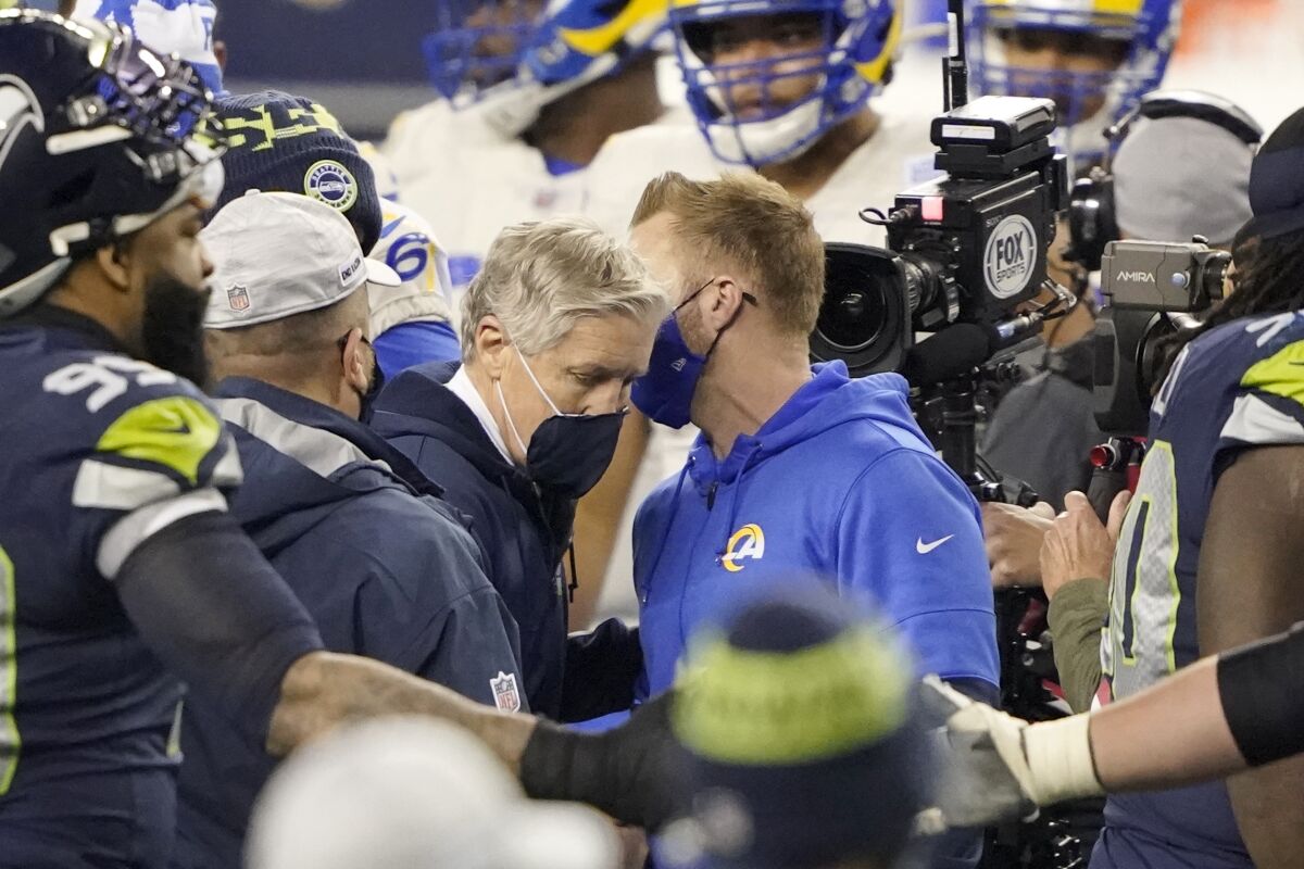 Seahawks coach Pete Carroll, left, and Rams coach Sean McVay talk after L.A.'s victory.