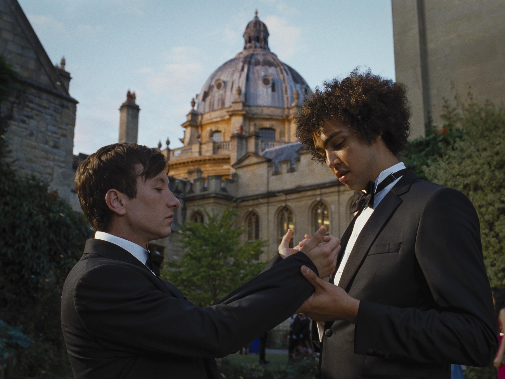 Two young men in formalwear.