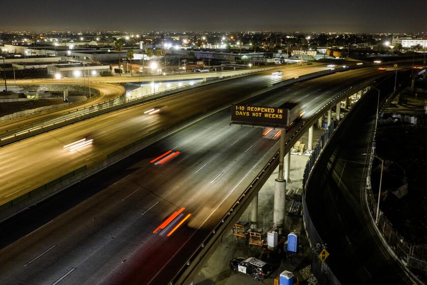 Los Angeles, CA - March 13: Vehicles use the10 Freeway as it reopens in downtown L.A. after weeklong closure in Los Angeles Monday, March 13, 2023. (Allen J. Schaben / Los Angeles Times)