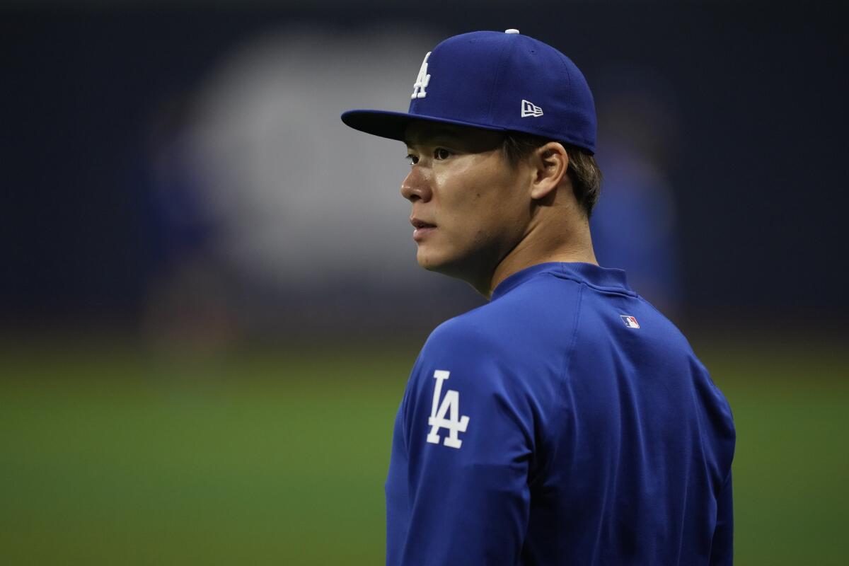 Dodgers pitcher Yoshinobu Yamamoto arrives at Gocheok Sky Dome in Seoul on Tuesday.