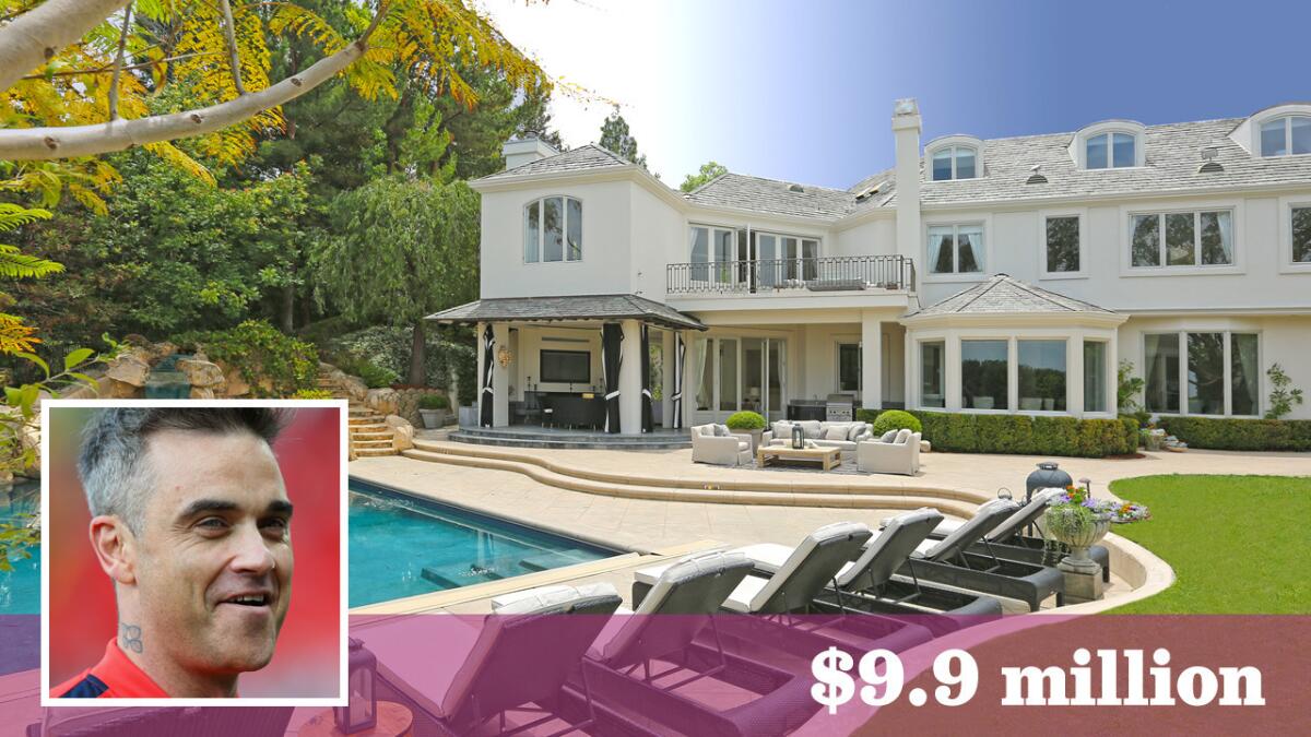 British singer Robbie Williams has sold his home in gated Mulholland Estates for $9.9 million.