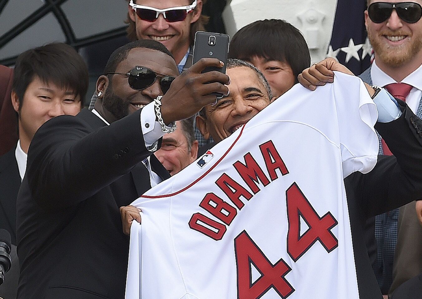 Red Sox Designated Hitter David Ortiz takes a selfie with President Obama after presenting a jersey during a ceremony on the South Lawn at the White House on April 1, 2014.