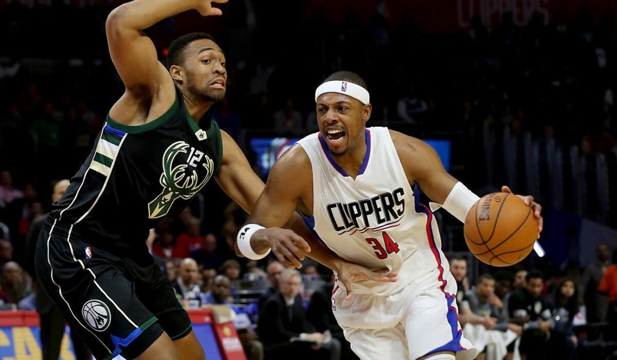 Clippers forward Paul Pierce drives to the basket against Bucks forward Jabari Parker during a game last season.