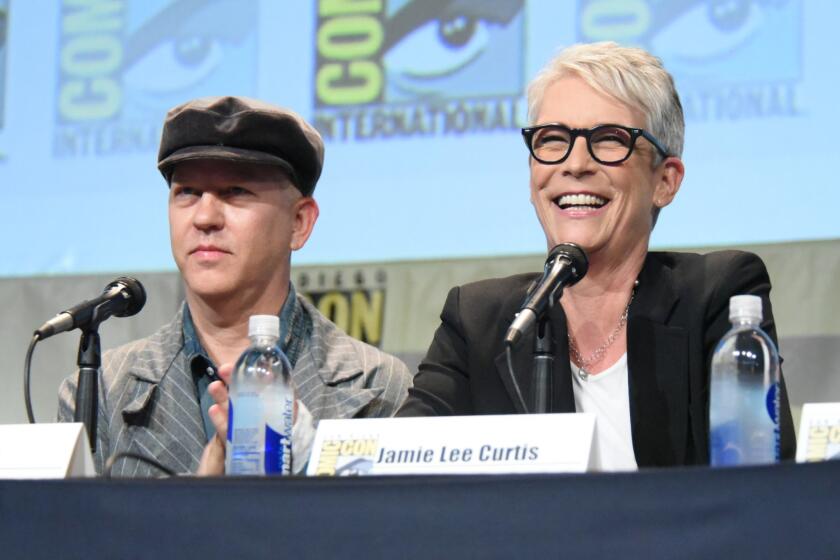 Ryan Murphy and Jamie Lee Curtis at the "American Horror Story" and "Scream Queens" presentation at Comic-Con International on July 12.