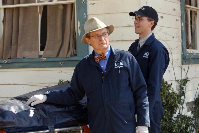 LOS ANGELES - APRIL 4: "Revenge" -- In retaliation for the murders of Eli David and Jackie Vance, the NCIS team feverishly searches for Bodnar despite orders from Homeland Security to relinquish the case, on NCIS, Tuesday, April 30 (8:00-9:00 PM, ET/PT) on the CBS Television Network. Pictured left to right: David McCallum and Brian Dietzen. (Photo by Monty Brinton/CBS via Getty Images)
