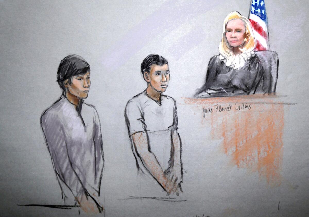 Dias Kadyrbayev, left, and Azamat Tazhayakov, friends of Boston bombing suspect Dzhokhar Tsarnaev, appear before Federal Magistrate Marianne Bowler in preliminary proceedings in May 2013 in this artist's sketch. A judge ruled Tuesday the pair and another man could be tried separately.