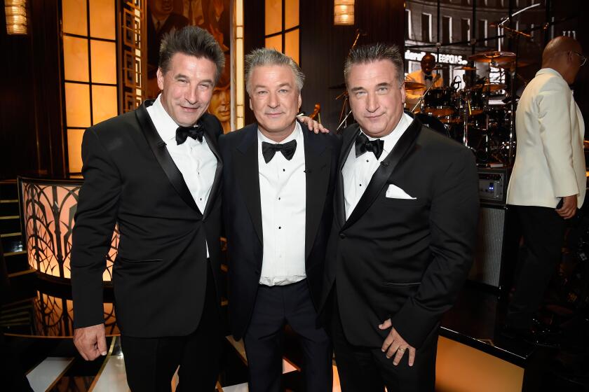 Three men in tuxedos