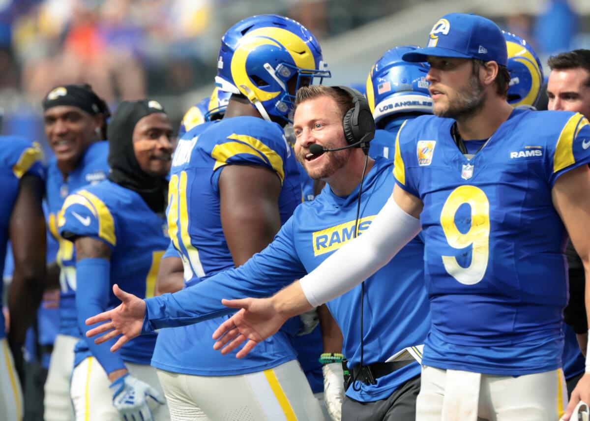 Rams coach Sean McVay and quarterback Matthew Stafford celebrate a defensive touchdown against the Packers on Oct. 6.