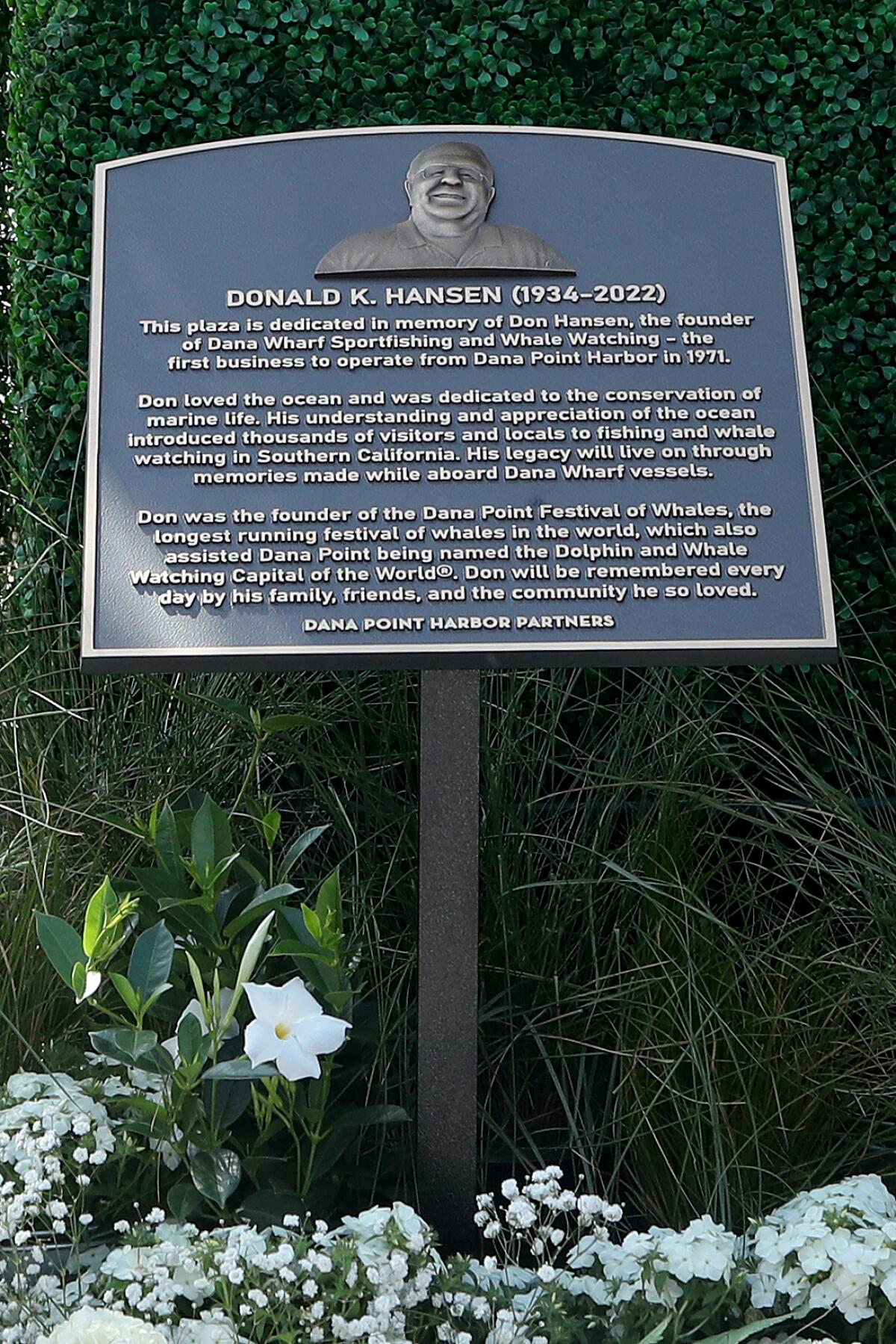 The Hansen Plaza plaque at Dana Wharf Sportfishing & Whale Watching honors Don Hansen.