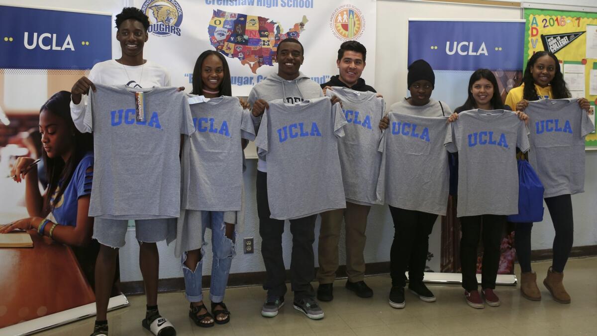 Seven prospective UCLA students from Crenshaw High School at an event meant to sway them to attend the university.