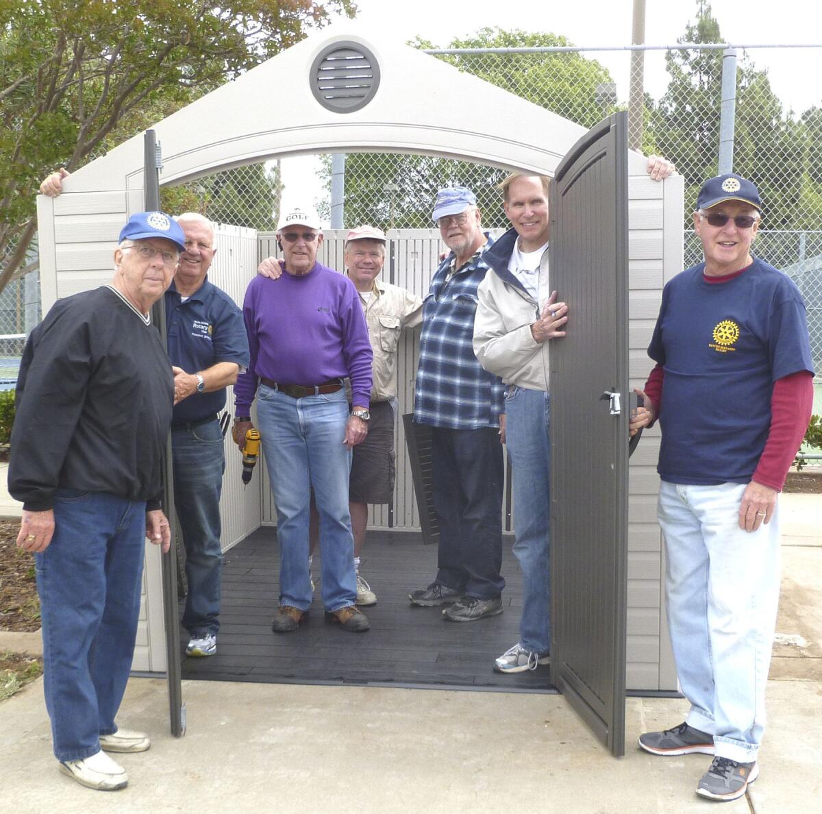 Ed Brown Senior Center’s new storage shed assembly at the half-way point. Pictured, from left, are Rancho Bernardo Rotarians Paul Donnick, Don Glover, Dan Malloy, John Goodrich, Larry Saunders, Dave Brooks and Ron Hunt.