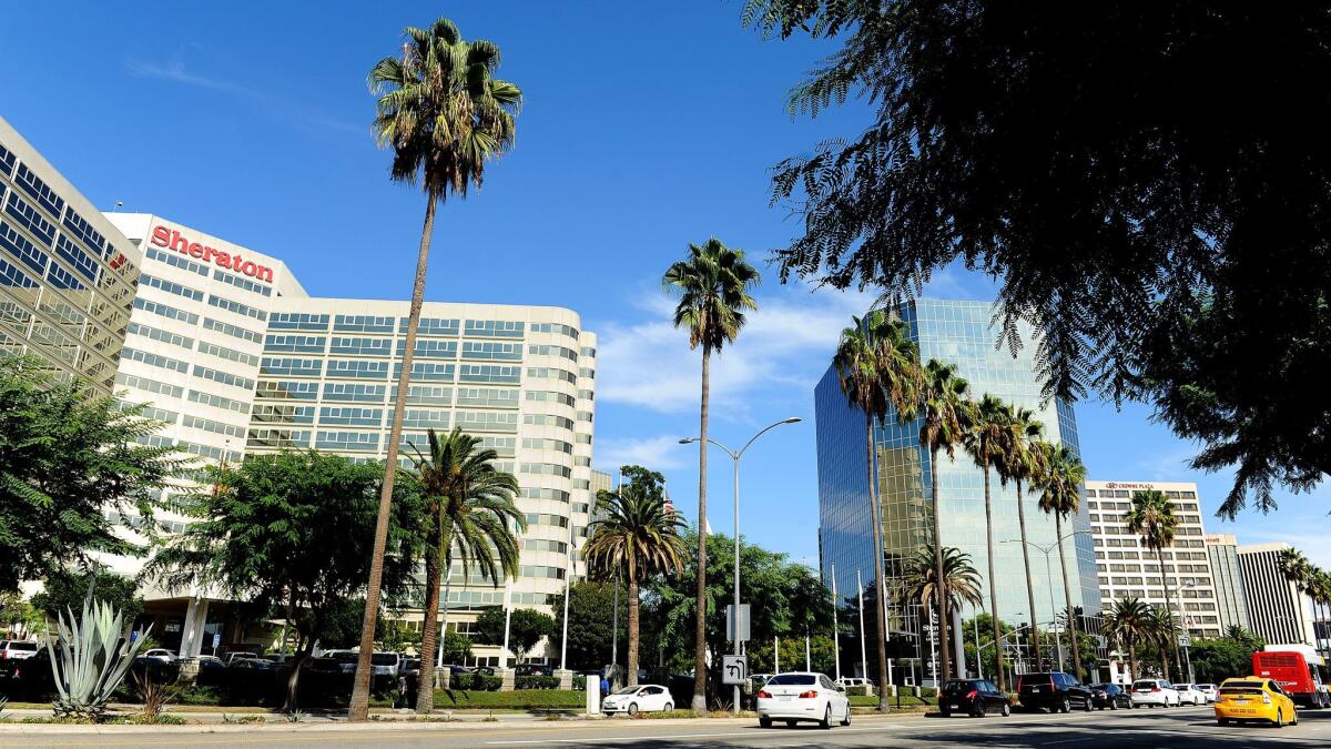 Hotels along Century Boulevard near Los Angeles International Airport. A study by the Rand Corp. found that the travel and tourism industries are more likely than other industries to hire recent graduates and the unemployed.
