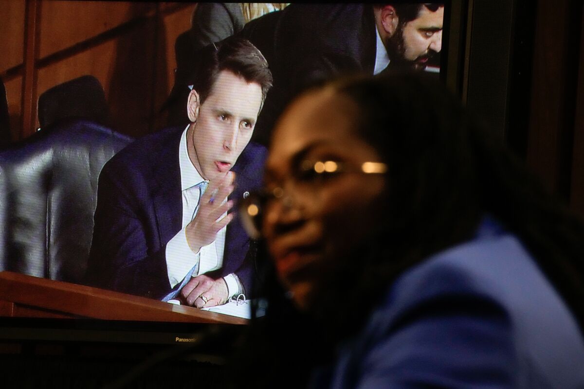 Judge Ketanji Brown Jackson, foreground, and Sen. Josh Hawley