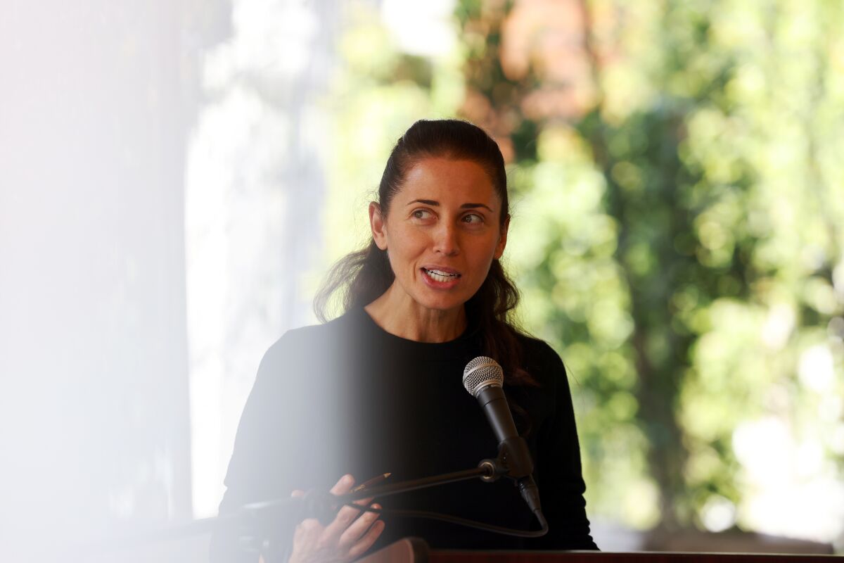Lili Anolik, author of "Hollywood's Eve: Eve Babitz and the Secret Life of L.A.," speaks during the memorial.