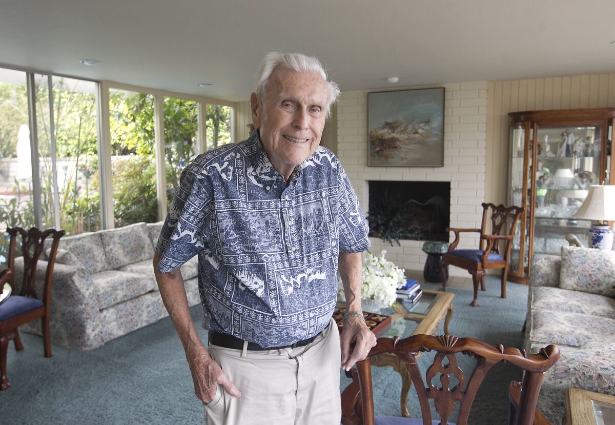 Ralph Bauer is pictured in his Huntington Beach home in 2017.
