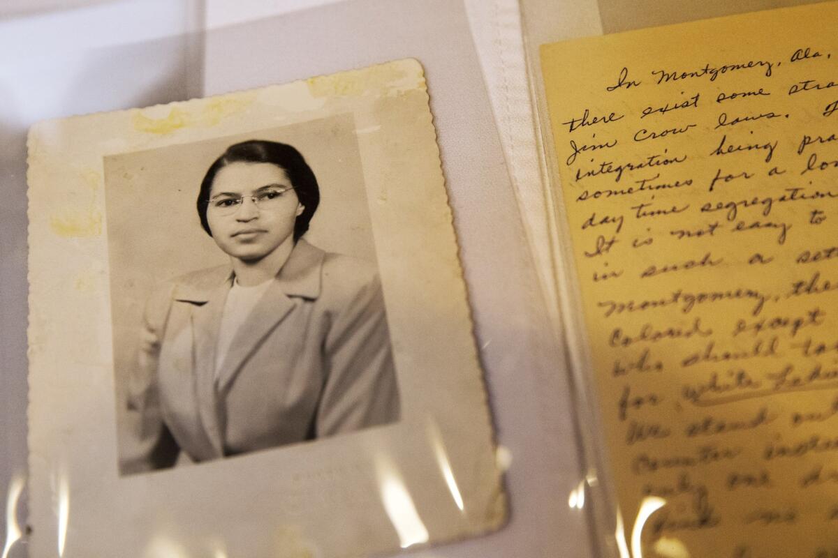 A photo of Rosa Parks from the 1950s and a paper written by Parks about segregation are some of the items in the Rosa Parks archive.
