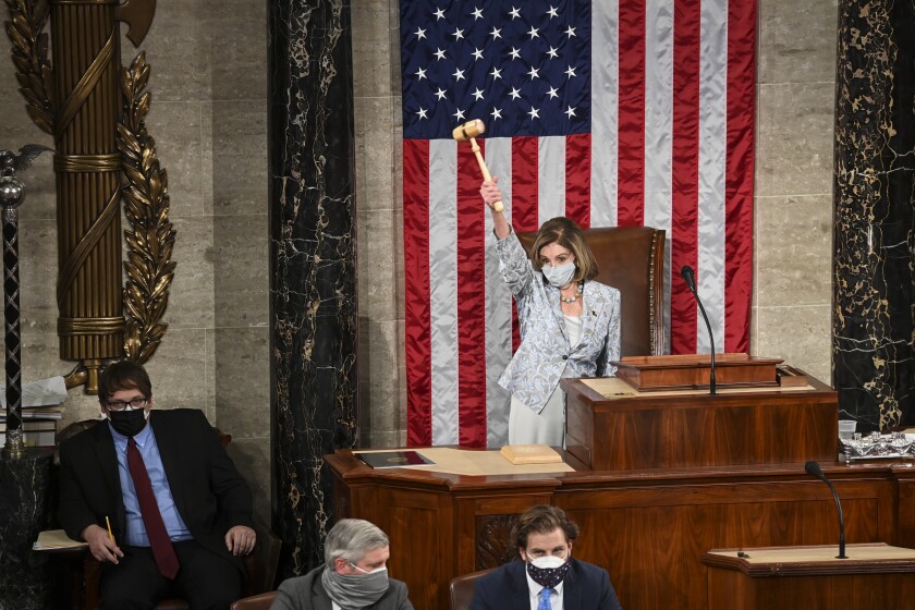Speaker of the House Nancy Pelosi (D-Calif.) waves the gavel on the opening day of the 117th Congress.