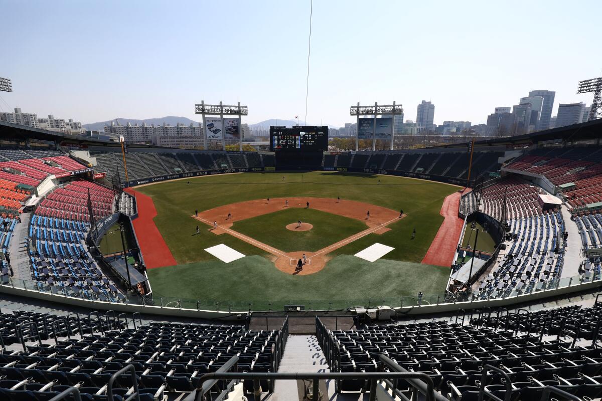 The LG Twins play an intrasquad scrimmage with no spectators present April 5 in Seoul.