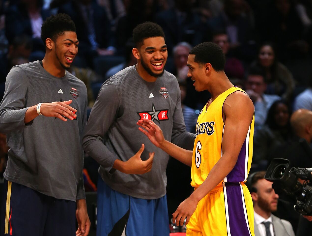 Lakers guard Jordan Clarkson shares a laugh with Pelicans forward Anthony Davis and Timberwolves forward Karl-Anthony Towns during the Skills Challenge on Saturday.