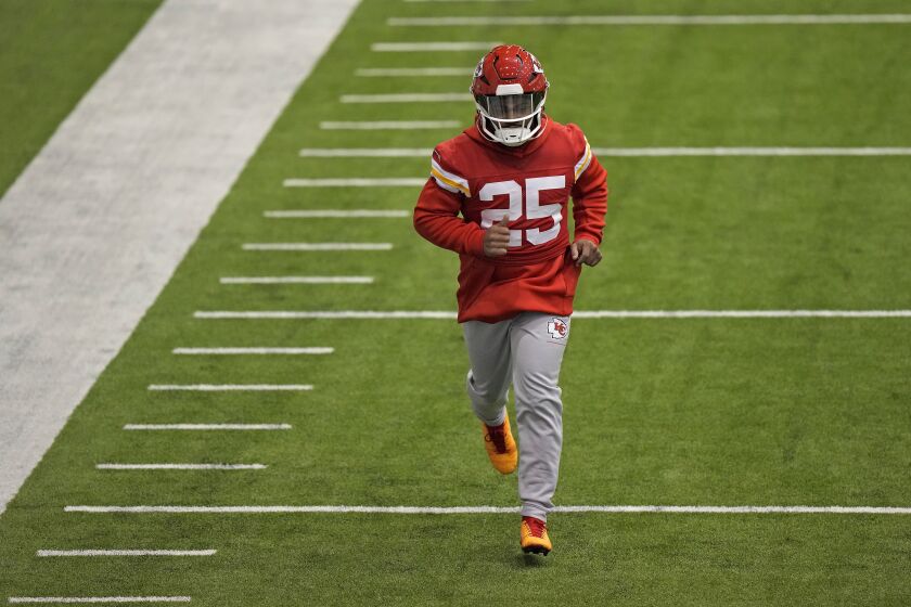 Kansas City Chiefs running back Clyde Edwards-Helaire runs during an NFL football workout Thursday, Jan. 26, 2023, in Kansas City, Mo. The Chiefs are scheduled to play the Cincinnati Bengals Sunday in the AFC championship game. (AP Photo/Charlie Riedel)