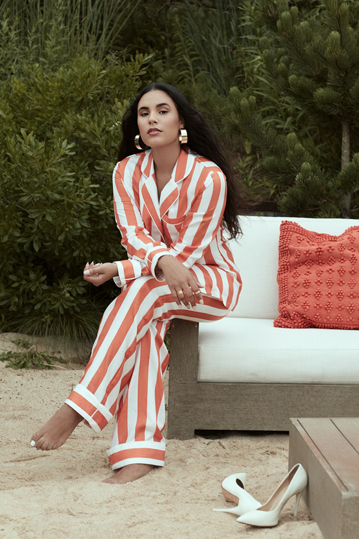 Model wears the Madinina silk blouse and pants from the Aliétte's resort collection