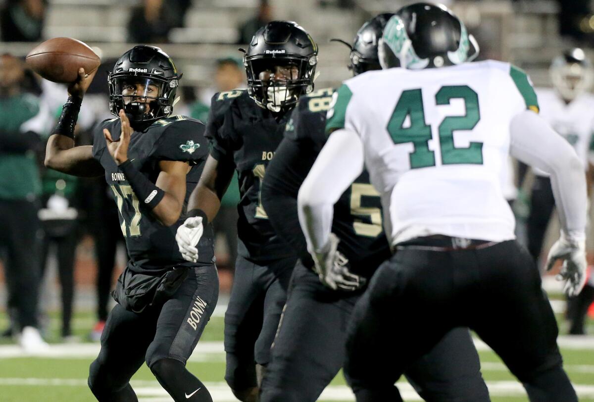 Narbonne quarterback Jalen Chatman throws a touchdown pass against Dorsey during the City Section Division I championship game on Dec. 3.